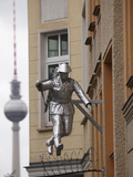Berlin Television Tower (Fernsehturm) and Sculpture of a Soldier Jumping the Berlin Wall at Bernaue