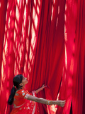 Woman in Sari Checking the Quality of Freshly Dyed Fabric Hanging to Dry  Sari Garment Factory  Raj