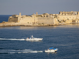 Fort Ricasoli from Valletta  with Yacht and Water Taxi Passing  Malta  Mediterranean  Europe