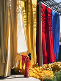 Woman in Sari Checking the Quality of Freshly Dyed Fabric Hanging to Dry  Sari Garment Factory  Raj