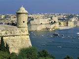 View over Bastions and Grand Harbour to Fort St Angelo with Rowing Regatta  Valletta  Malta  Medit