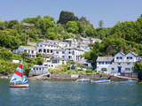 A Dinghy Sails Past the Village of Boddinick Near Fowey  Cornwall  England  United Kingdom  Europe