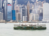 Star Ferry Crosses Victoria Harbour with Hong Kong Island Skyline Behind  Hong Kong  China  Asia