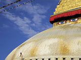 Man Praying in Front of the Dome of Boudha (Bodhnath) (Boudhanath) Stupa  Kathmandu  UNESCO World H