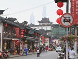 Pedestrians and Traffic on Shanghai Old Street  Remnant of a Bygone Age  Fuxing  Shanghai  China  A