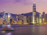 The Skyscrapers of Hong Kong Island Illuminated at Sunset across Victoria Harbour  Two Internationa