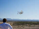 Virgin Galactic's White Knight 2 with Spaceship 2 Above the Runway at the Virgin Galactic Gateway S