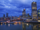 Skyline and the Waterfront in the Evening from Canada Place with the Seabus Terminal and Harbour Ce