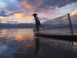 Intha Fisherman Rowing Boat with Fishing Net on Inle Lake  Myanmar  Asia