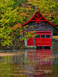 Old Forge Red Boathouse on Lake Shore  New York  Usa