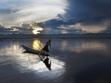 Intha Fisherman Rowing Boat with Fishing Net on Inle Lake  Myanmar  Asia