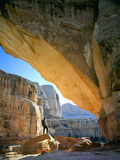 Hiker Below Natural Navajo Sandstone Hickman Bridge  Capitol Reef National Park  Utah  Usa