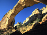 Hiker Below Natural Navajo Sandstone Hickman Bridge  Capitol Reef National Park  Utah  Usa