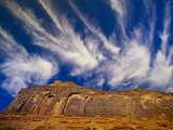 Clouds Hover Above a Sandstone Wall Along the Colorado River