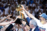 Miami  FL - June 21:  The Miami Heat celebrate with the Larry O'Brien Finals Championship trophy