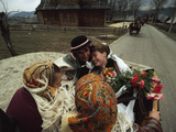 A Bride and Groom Ride in a Carriage after their Wedding Ceremony