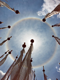 A Very Unusual Full Circle Rainbow Phenomenon Surrounded by Lungdhar Buddhist Prayer Flags