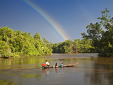 Venezuela  Delta Amacuro  Orinoco Delta  Warao People in Boat on Nararina River with Rainbow in Sto