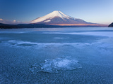 Ice on Lake Yamanaka with Snowcovered Mount Fuji in Background  Japan