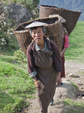 Women with Large Bamboo Baskets Go to Collect Produce from their Hillside Farms in the Mangde Chhu 