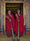 Two Monks Blow Long Horns Called Dung-Chen  at the Temple of Wangdue Phodrang Dzong (Fortress)