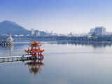Taiwan  Kaohsiung  Lotus Pond  View of Bridge Leading to Spring and Autumn Pagodas with Statue of S