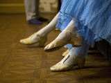 StPetersburg  Russia  Detail of Ballerinas Shoes and Dress During a Short Rest Backstage During th