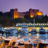 Palace of the Grand Masters and Mandraki Harbour Illuminated at Dusk  Rhodes Town  Rhodes  Greece