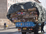 Workers Loading a Truck with Cardboard for Recycling in Suihua  Heilongjiang Province  China 