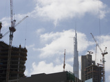 A Construction Site in Dubai Looking Towards the World's Tallest Building  the Burj  Dubai