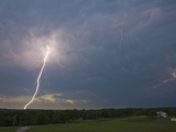 Bright Cloud-To-Ground Lightning Flash and Intracloud Lighting from the Anvil