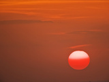 Sun in a Red Sky at Sunset  Serengeti National Park  Tanzania  Africa