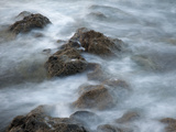 Blurred Motion of Waves Crashing over Rocks