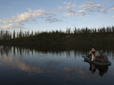 Two Undergraduate Students Use a Van Dorn Sampler to Collect Water Samples