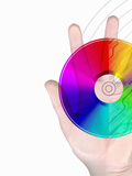 Illustration of a Human Hand with a Computer Disc and Circuit Board Design on a White Background