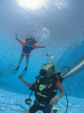 Junior Open Water Diver in Training with Young Girl Snorkeling in the Pool  Egypt