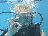 Young Boy Receiving Padi Seal Training in Pool  Egypt
