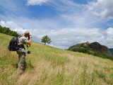 A Photographer in the Beautiful Scenario of the Apennines  Italy