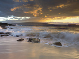 Sunset Light on Waves Crashing onto a Beach  with Molokini and Kaho`Olawe Islands in the Background
