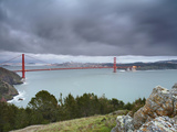 A Large Storm Sweeping into San Francisco Bay at Sunset  with the Golden Gate Bridge