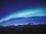 Aurora Borealis  Night Landscape Lit by a Full Moon  North America  Alaska  Alaska Range Mountains