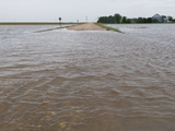Agricultural Flooding from a Thunderstorm Covers a Rural Road in Western Nebraska