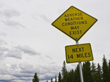 A Road Sign Warns of Adverse Weather Conditions Along the Continental Divide