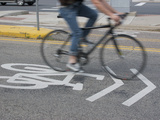 A Cyclist Riding on an Urban Street  Boulder  Colorado  USA