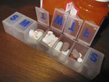 Daily Pill Reminder Containers with Medications