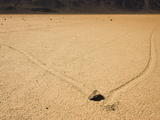 Moving Rock and Trail on Racetrack Playa  Death Valley Np the Rocks Slowly Move across the Surface