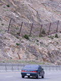 A Reinforced Metal Net Protects Motorists from Small Rockfalls Along an Interstate in Colorado