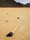Moving Rock and Trail on Racetrack Playa  Death Valley Np the Rocks Slowly Move across the Surface