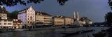 Boats in a River with a Cathedral in the Background  Grossmunster Cathedral  Limmat River  Zuric