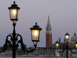 Lampposts Lit Up at Dusk with Building in the Background  San Giorgio Maggiore  Venice  Italy
